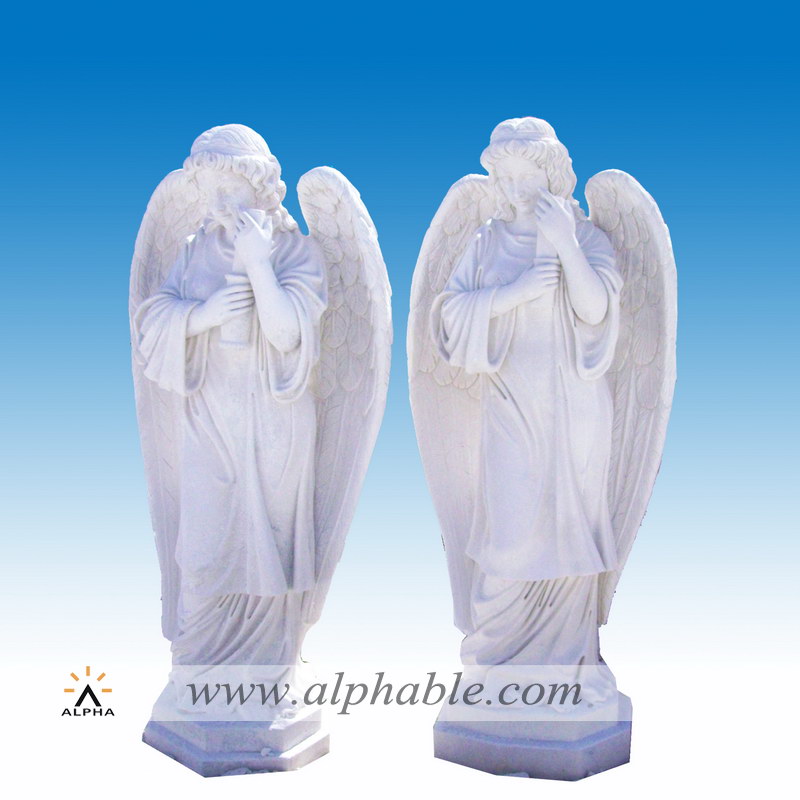 Marble guardian angel statue